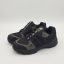 جفت کفش کتانی زنانه آدیداس ترکس مشکی خاکستری در پس‌زمینه سفید
